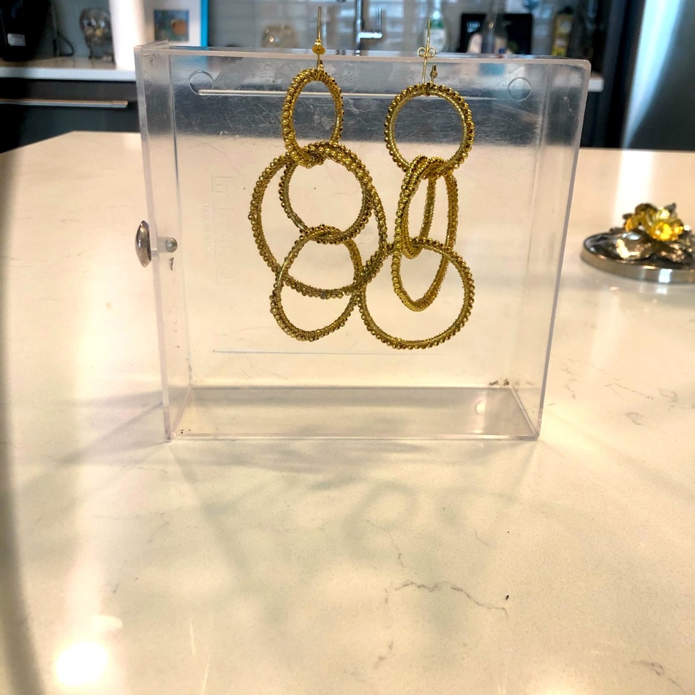 Gold colored Dangling Statement Earrings